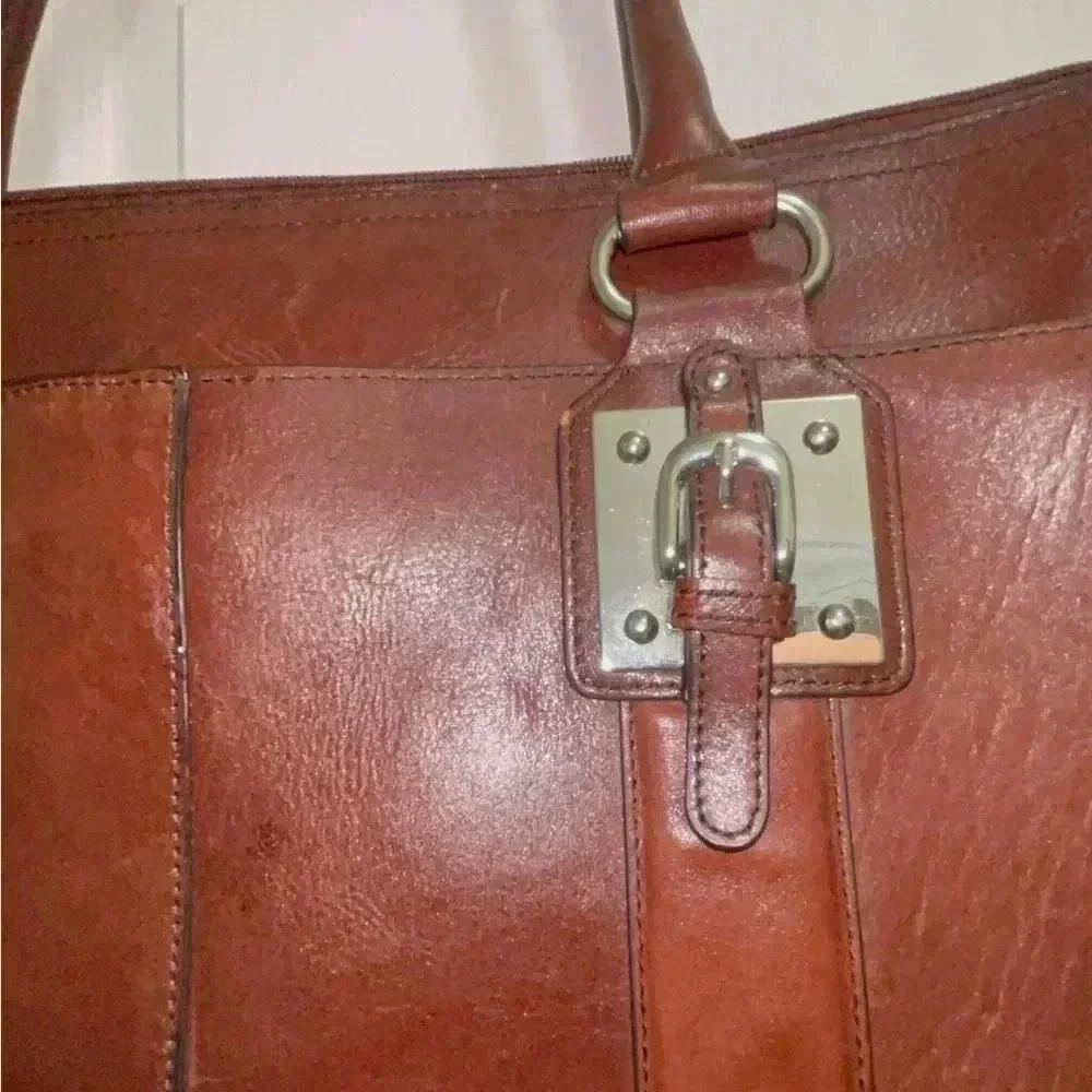 Wilson leather original back, rown color great conditions with adjstbel strap